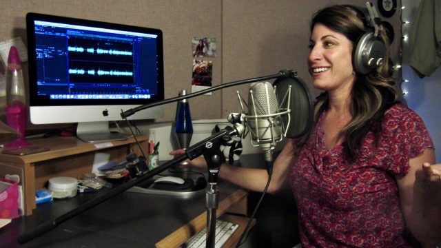 A voice acting coach editing her voice over.